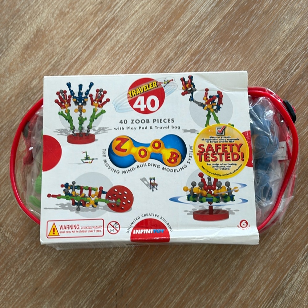 New Sealed Infinitoy 40 Zoom Pieces Traveler W/Play Pad & Travel Bag